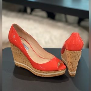 PRADA Coral Patent Peep Toe Wedges